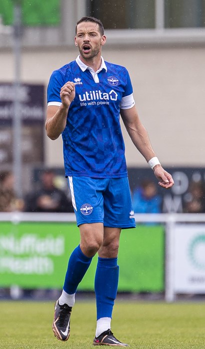 Aaron Martin captaining his side in a match