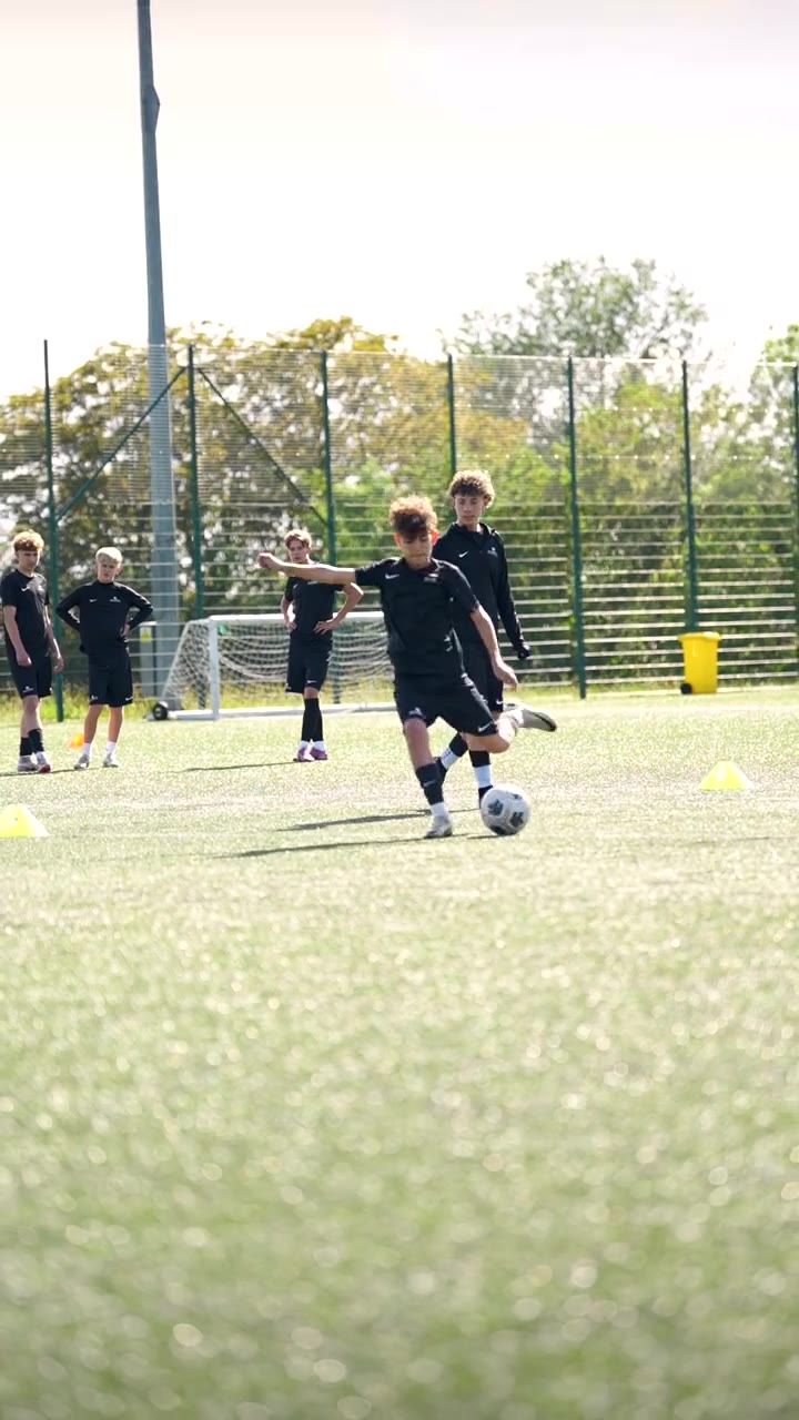 AMFA players in a group dribbling drill